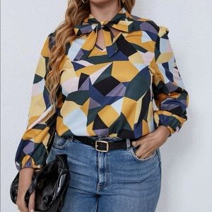 Geometric blouse with tie neck